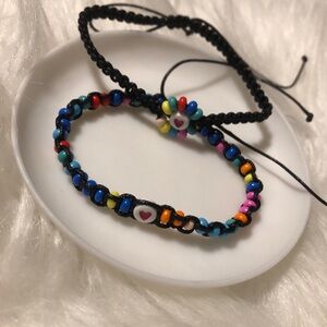 Two adjustable string bead colorful bracelets